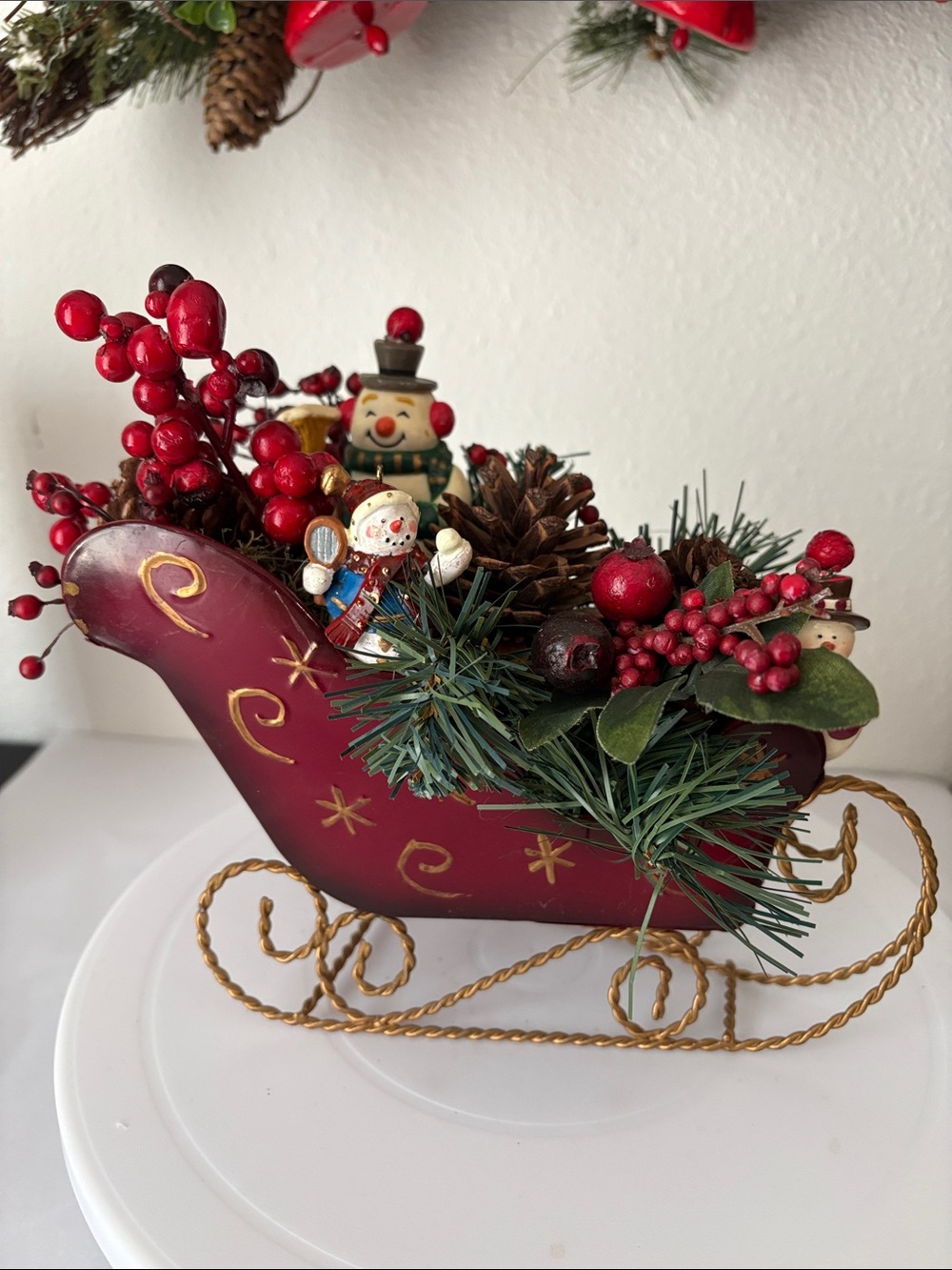Source Unknown Red and Green Holiday Sleigh Centerpiece